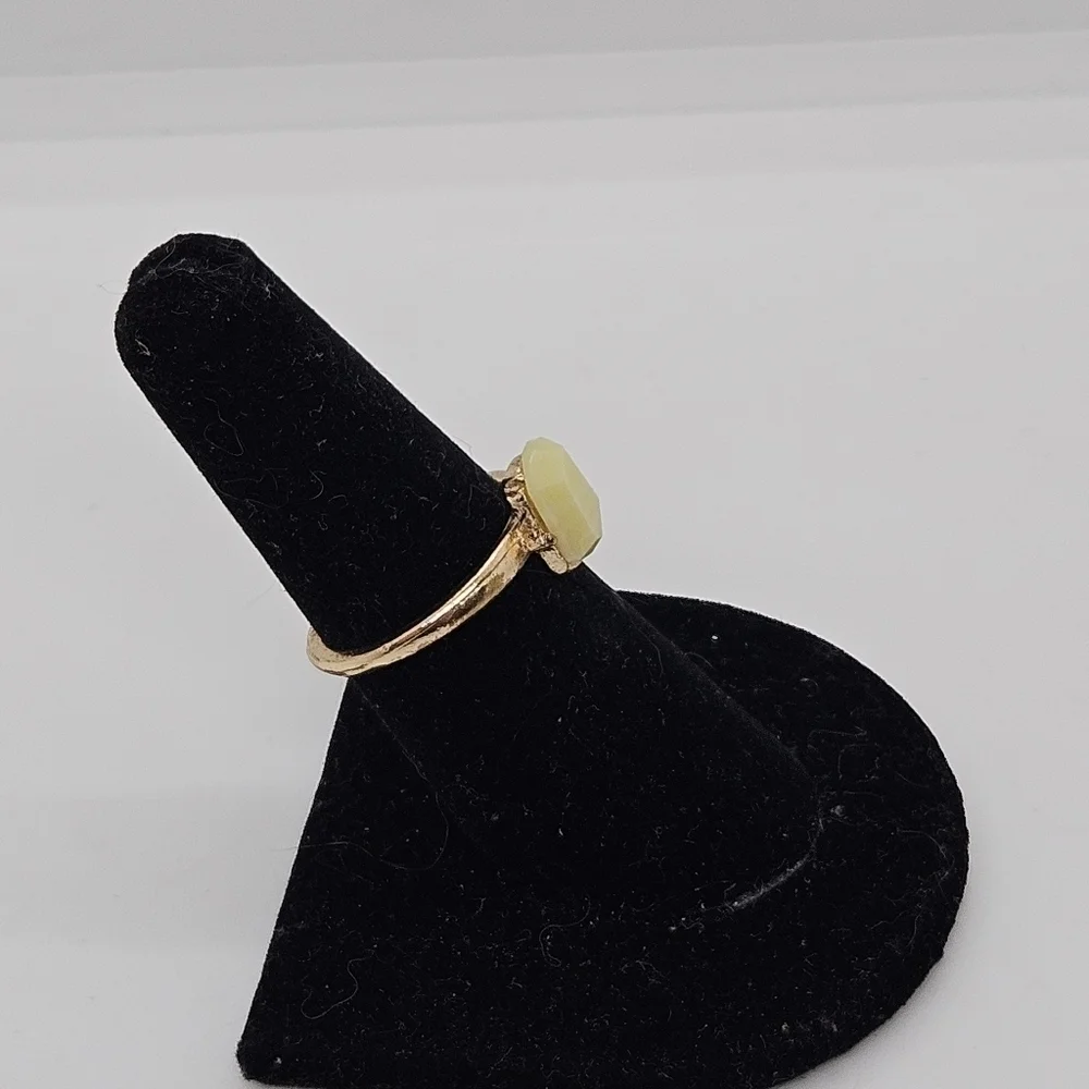 gold tone ring with light yellow faux stone size 6.5